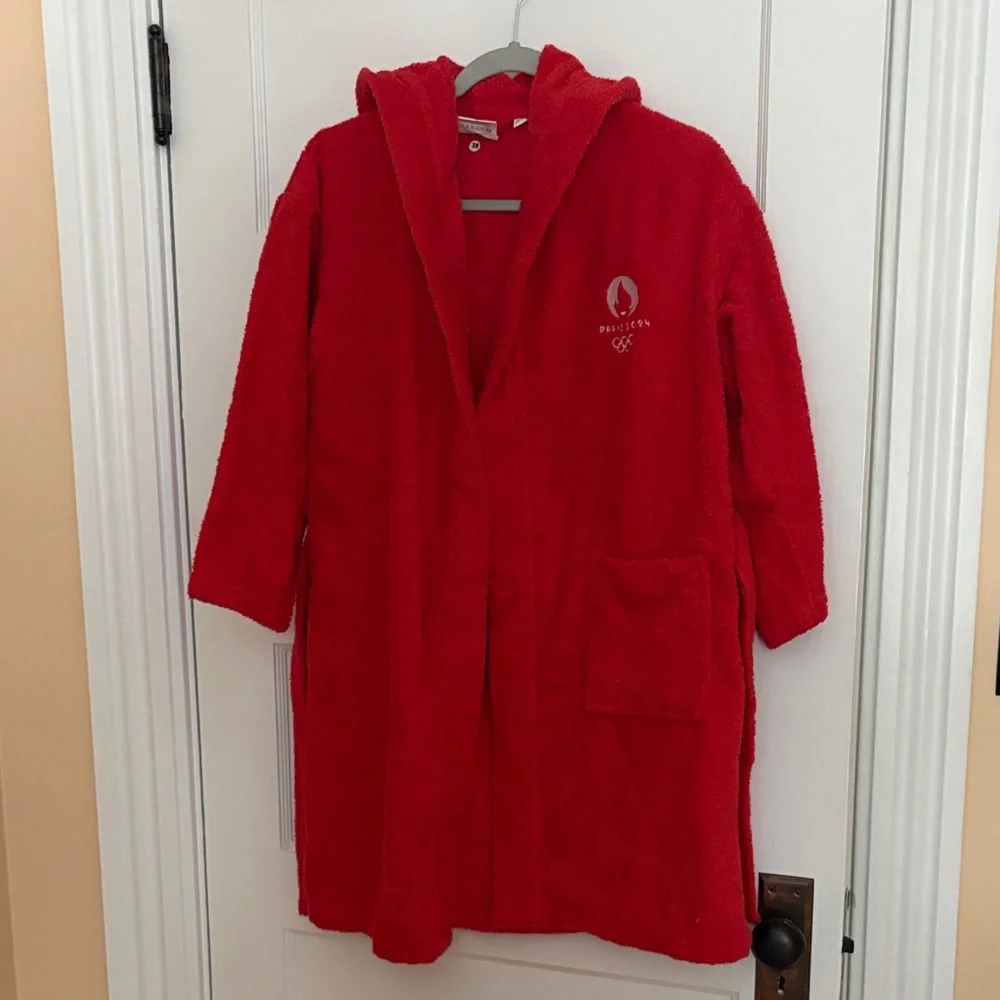 New without tag.  Red Hooded Robe 2024 Olympic games logo. Size 10-12. Cotton